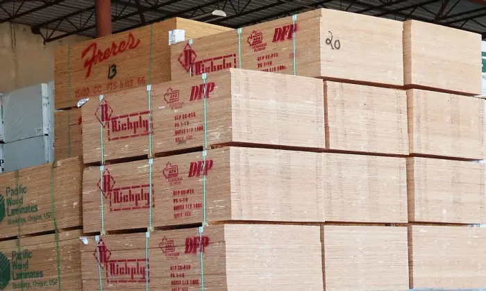 Stacks of plywood in warehouse